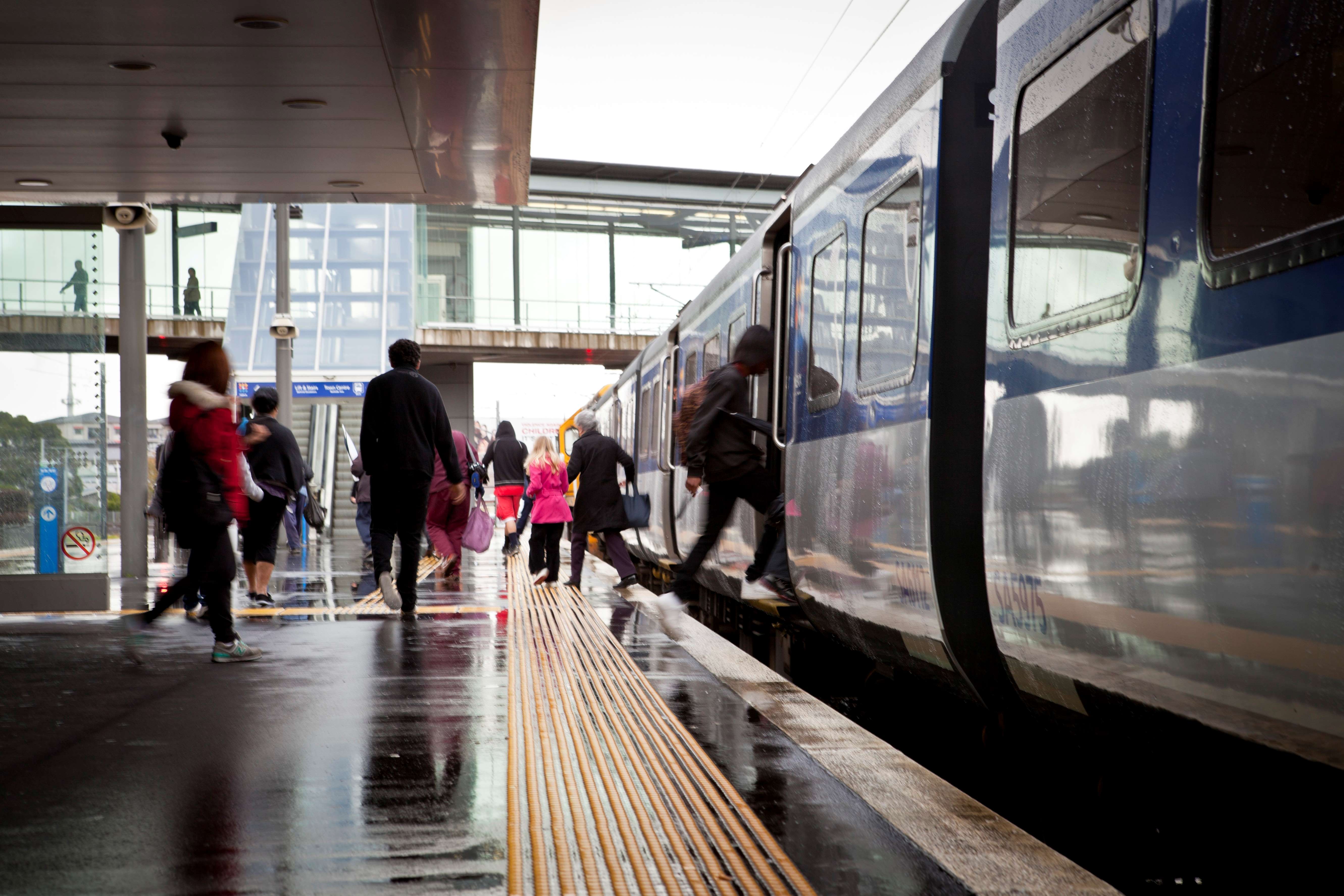 Busy train station connecting people to work, shops, and community activities,