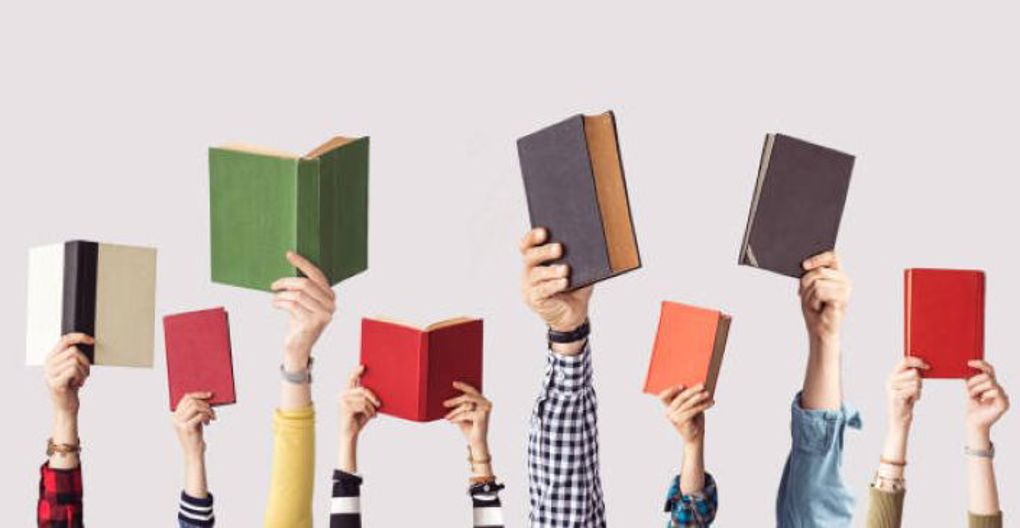 hands holding books 2_yiqad3i5.jpg