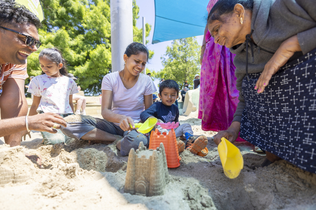 Locals Enjoying Sand Play At Olympic Park