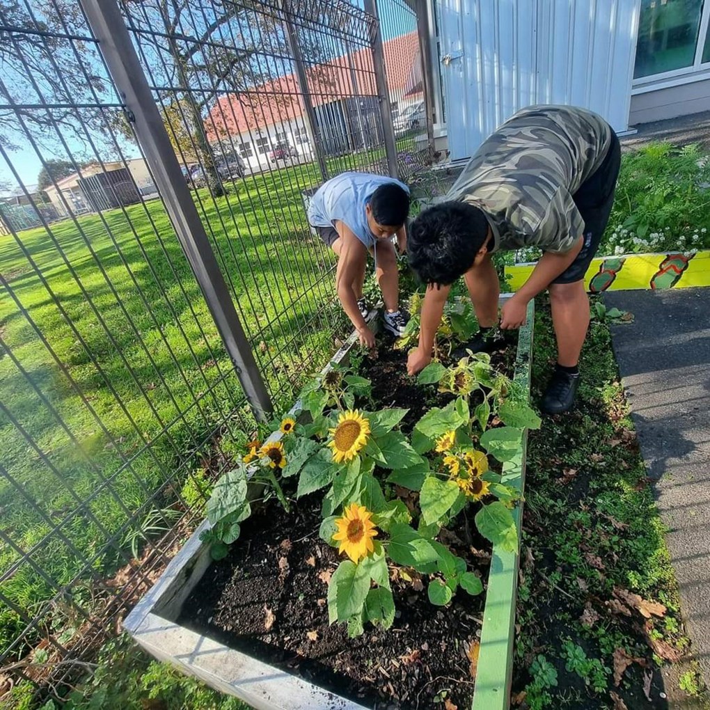 Young people out in the local garden