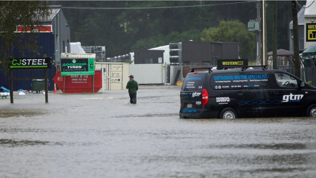 Kumeu shopping precinct under water during 2023 Anniversary weekend floods