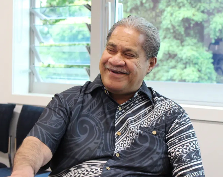 A man in a Polynesian shirt.