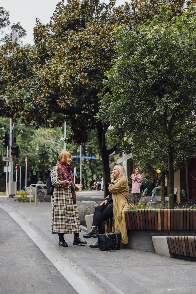 Two ladies socialising on Victoria St