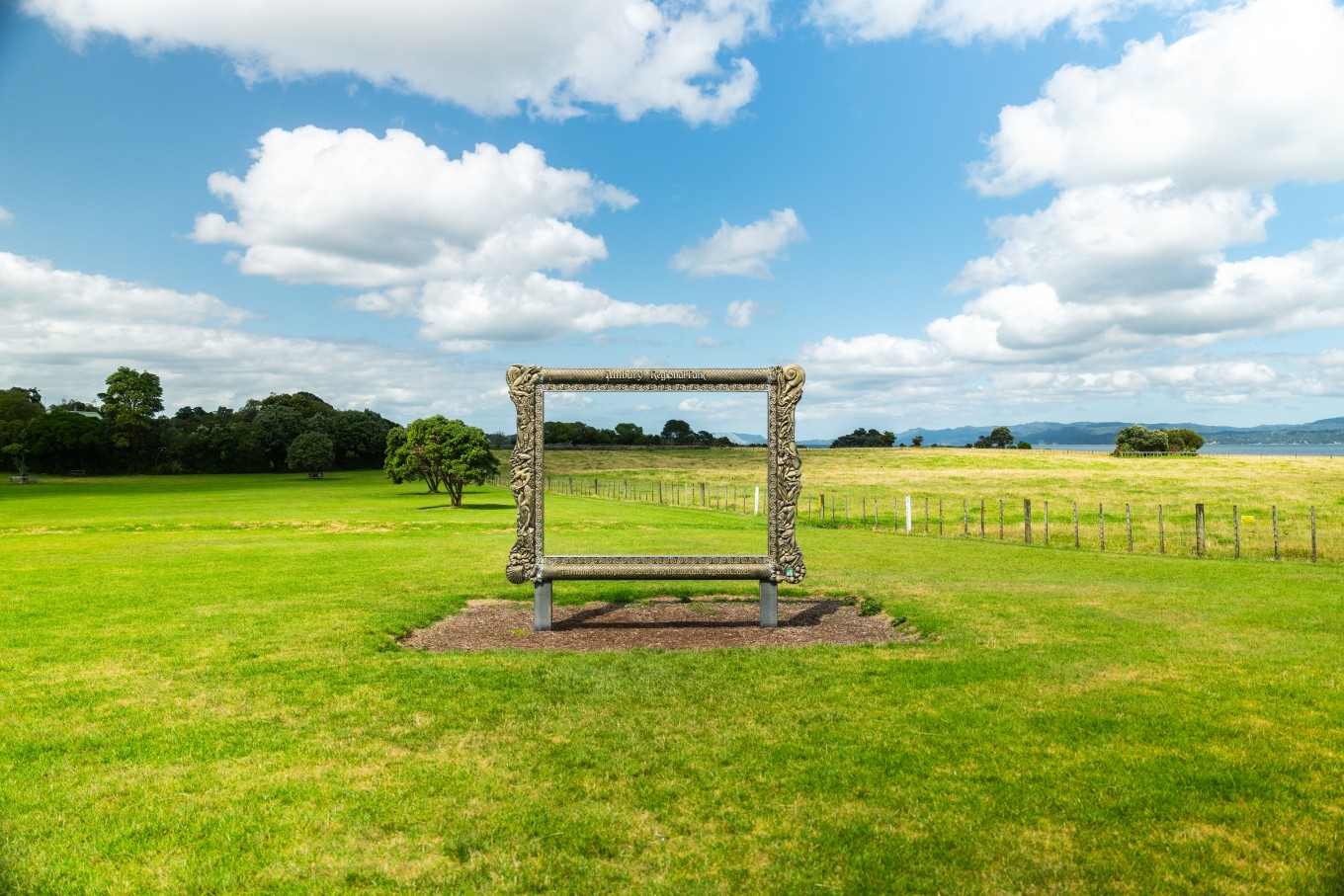 A large photo frame for people to visit at Ambury Regional Park.