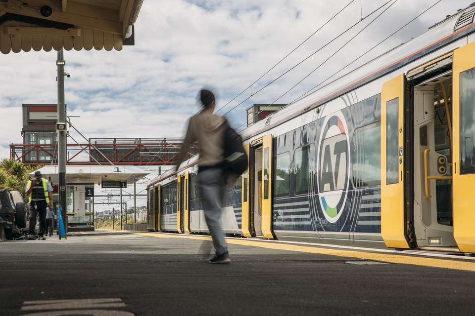 A person walking to catch a train. 