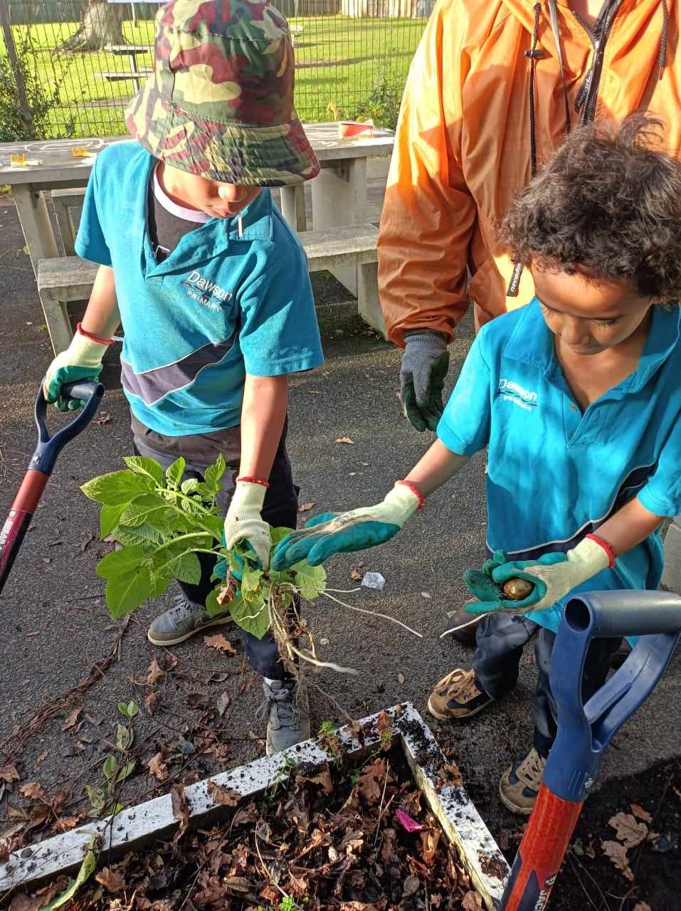 Children composting.