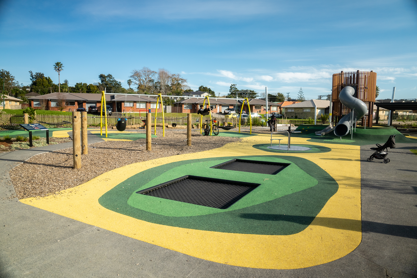 A local playground with a jump pad. 