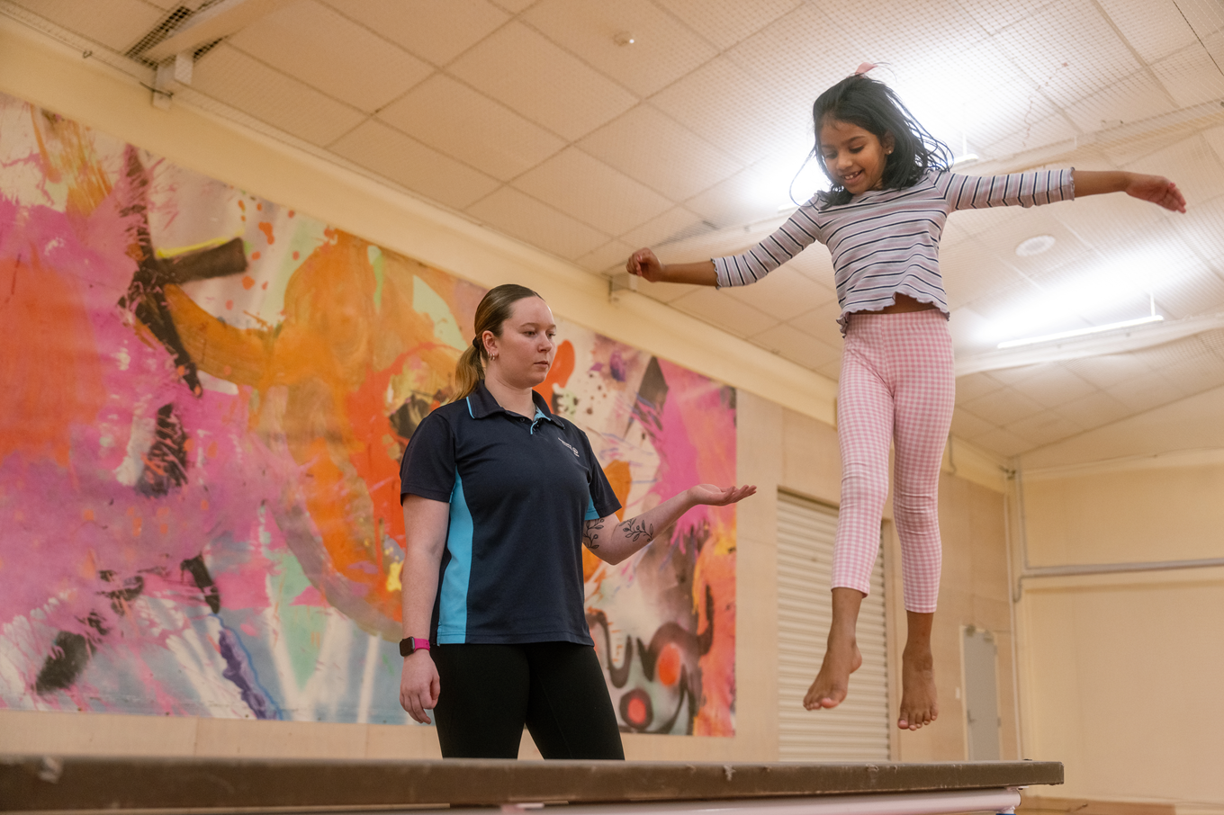 A girl doing gymnastics at a Auckland Council lesiure centre.