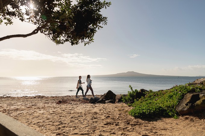 Women On A Morning Beach Walk
