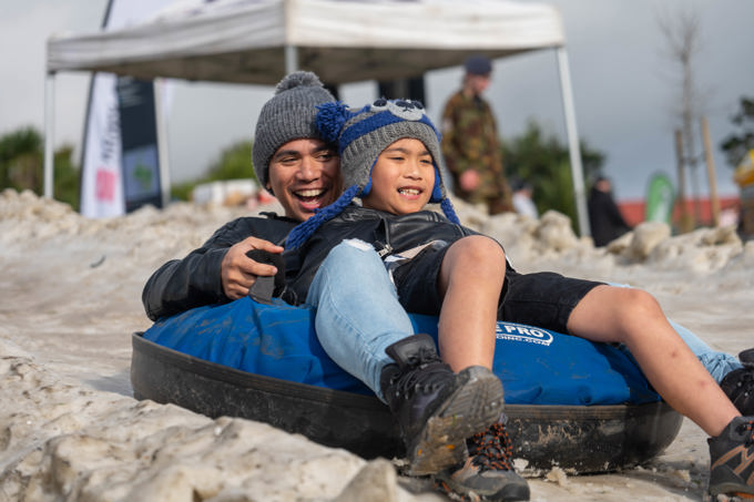 People on impromptu sled