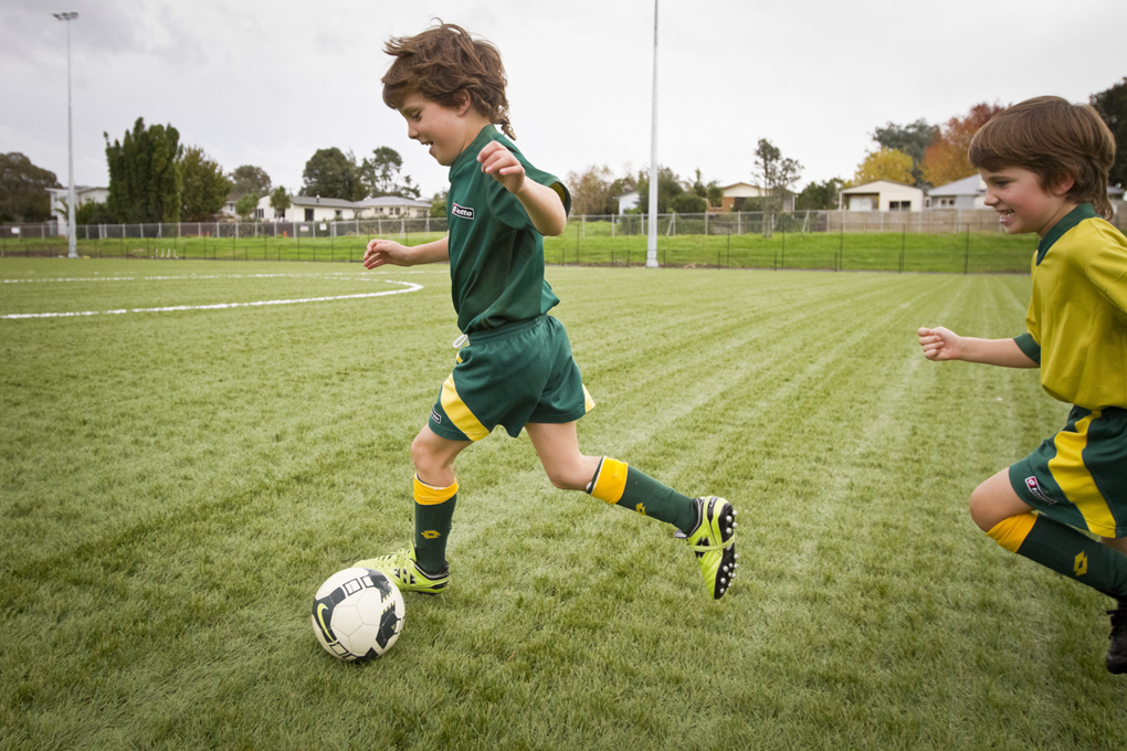 Kids playing soccer