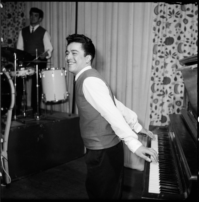 A Person Playing The Piano