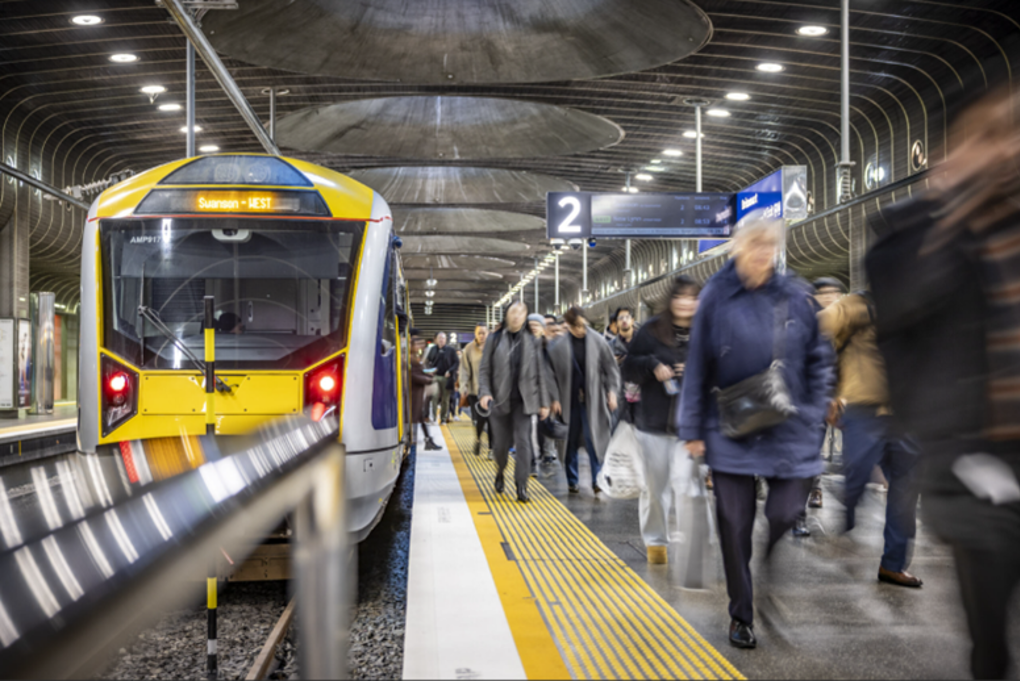 Commuters Disembarking A Train AT Supplied