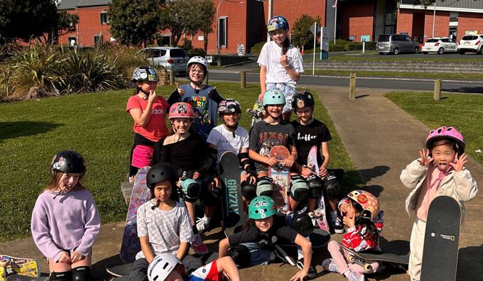 Young girls learning to skate