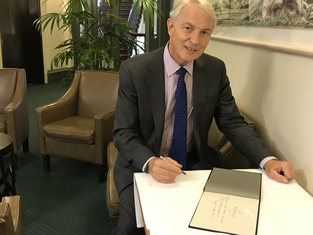 Mayor signing book
