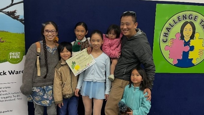 Family receiving an award