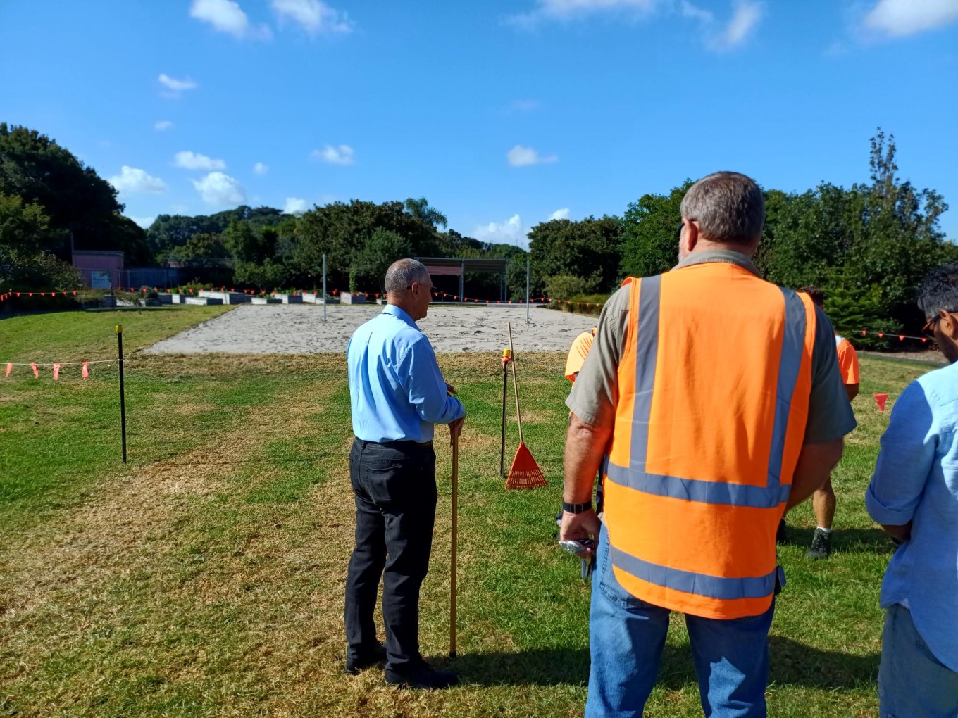 Auckland Council staff blessing the opening of the new volleyball court.