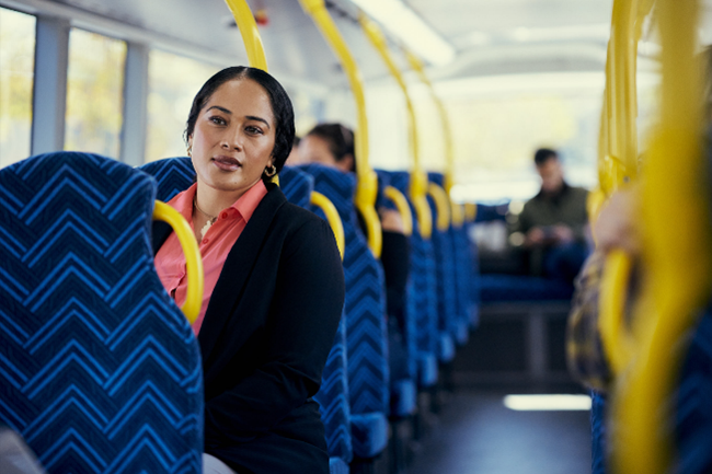 Person sitting on a bus