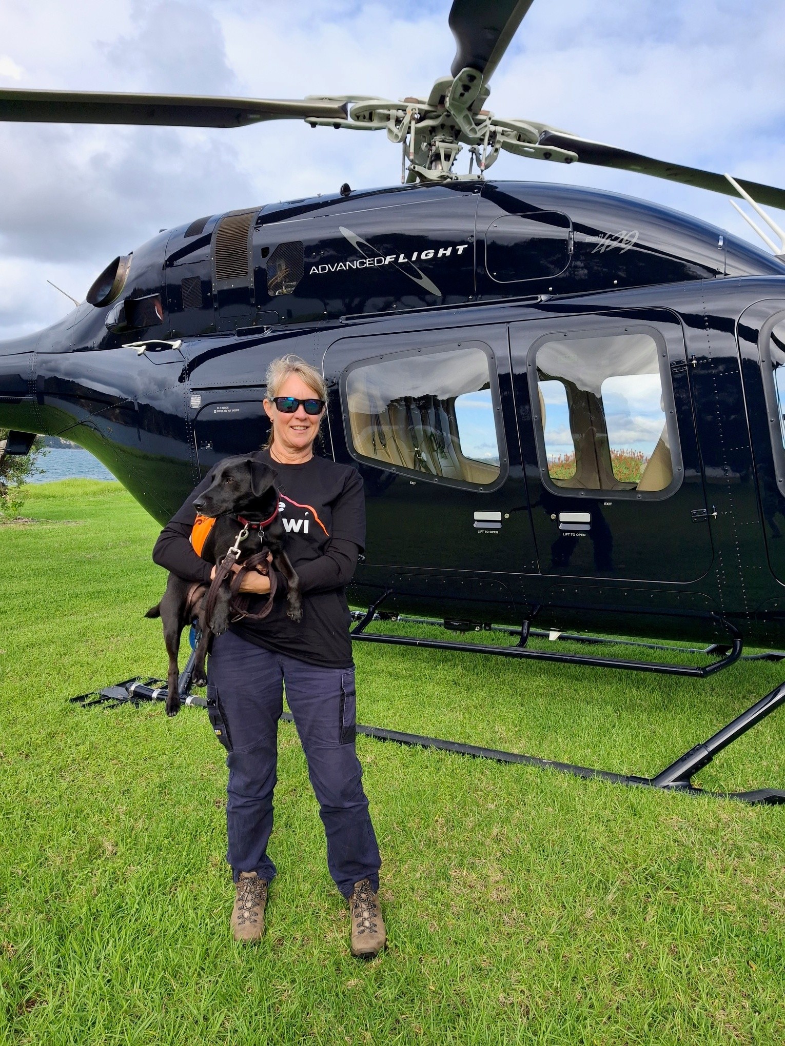 Ronnie the dog getting ready for a ride in the helicopter. 