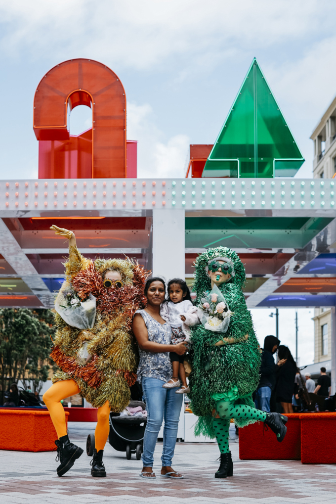 Festive 2023 Tinsel People And Young Family