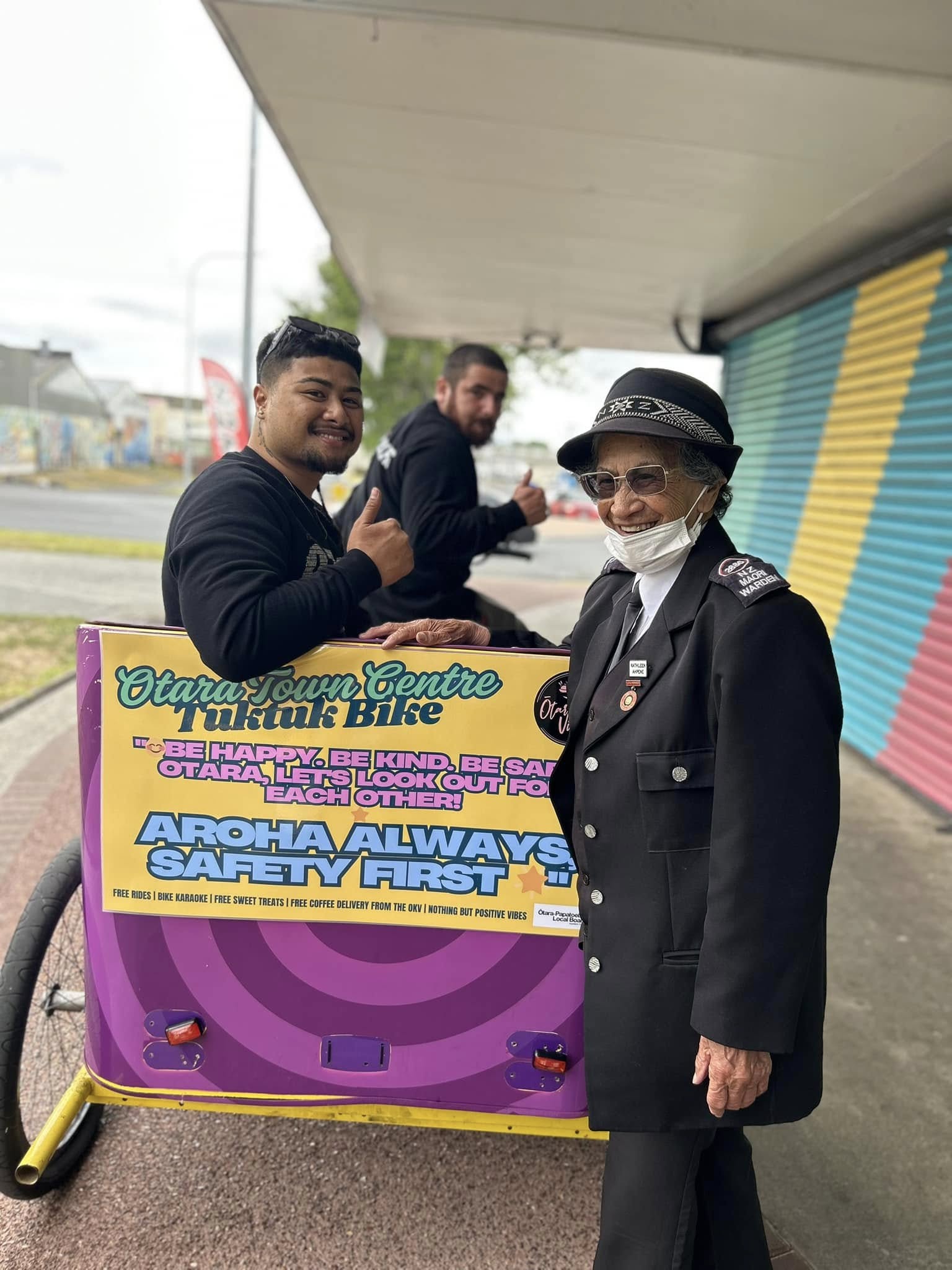 Local Māori warden enjoying tuk-tuk.