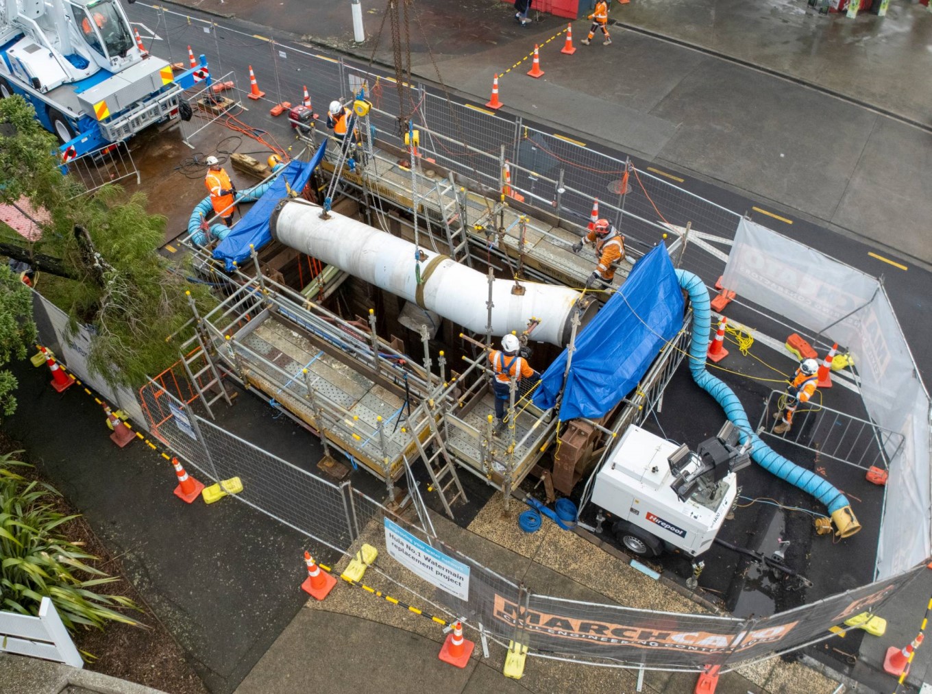 A final section of the Huia 1 replacement pipeline is lowered in.