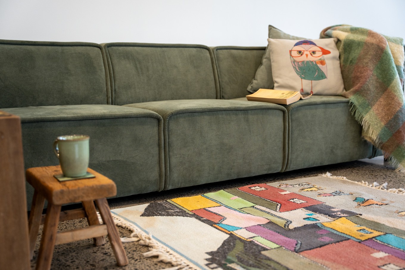 A living room area redesigned by second hand items. 