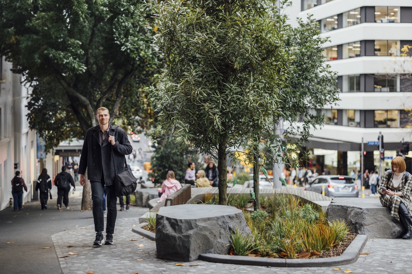 Man walking on Victoria St.