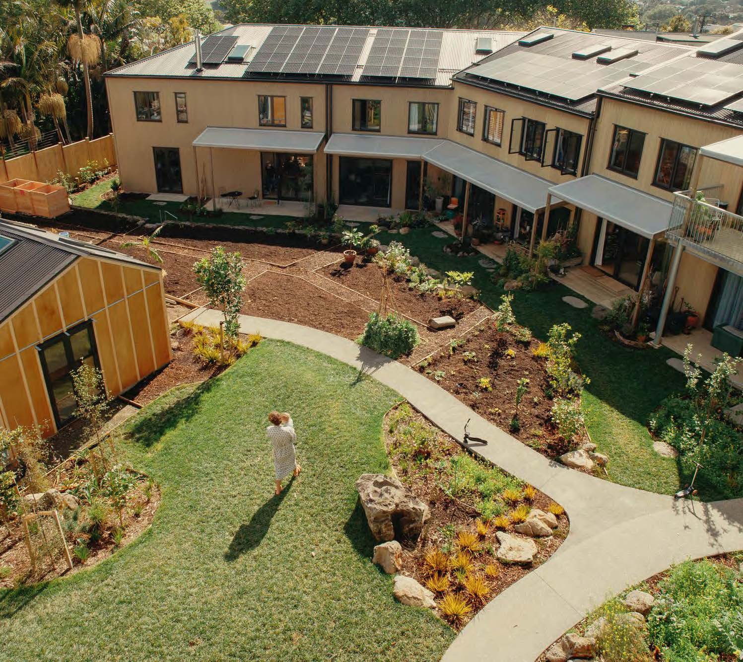 An aerial shot of a housing development in a urban area.