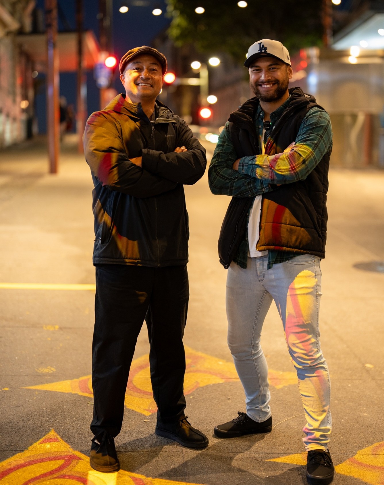 Two local artists at Mercury Lane at night time. 
