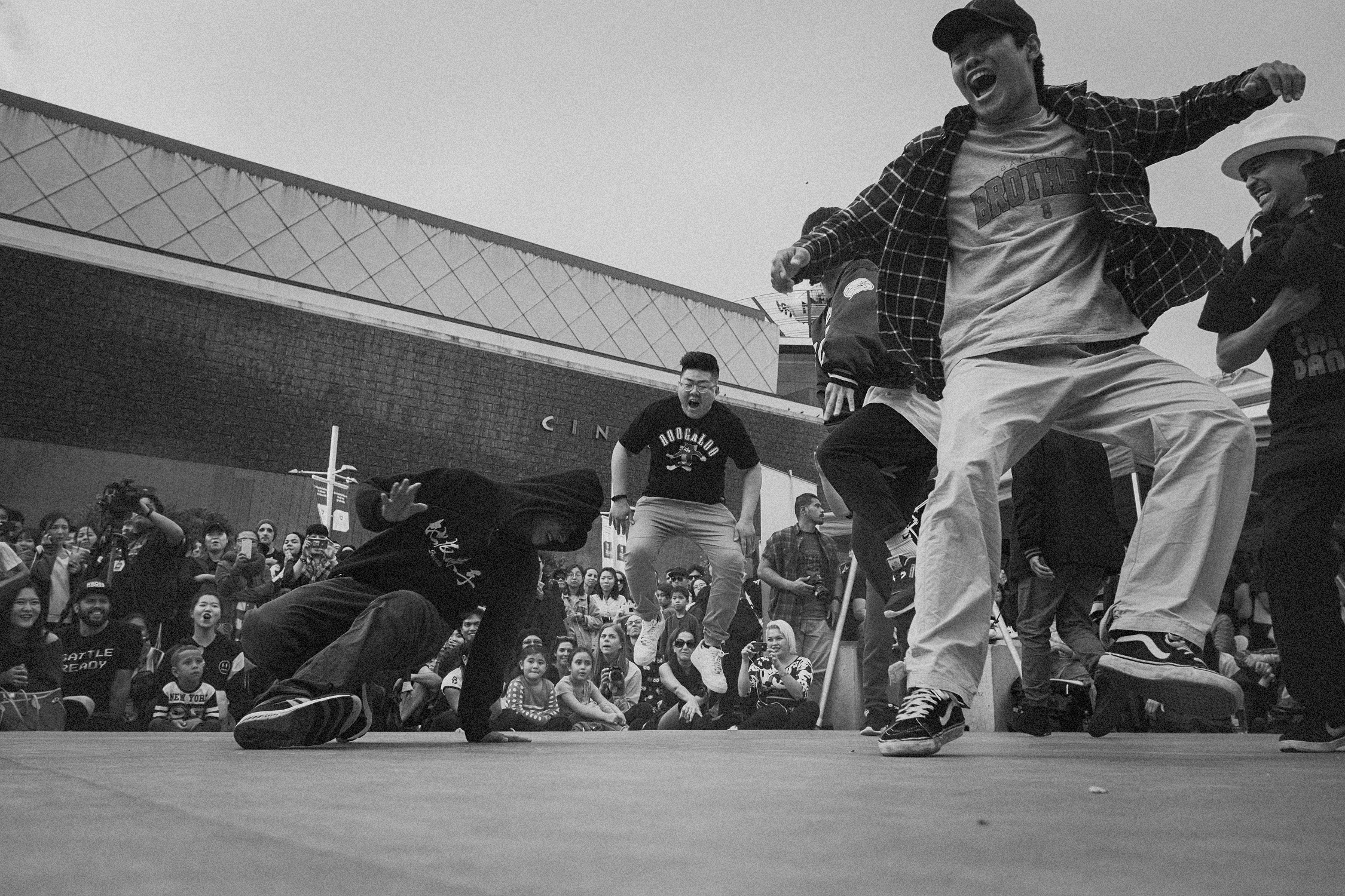 Black and white photo of breakdancers.