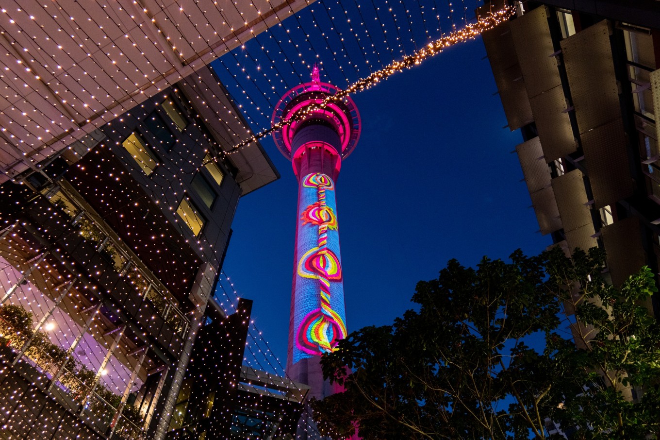 Sky Tower wrapped in woollen light.