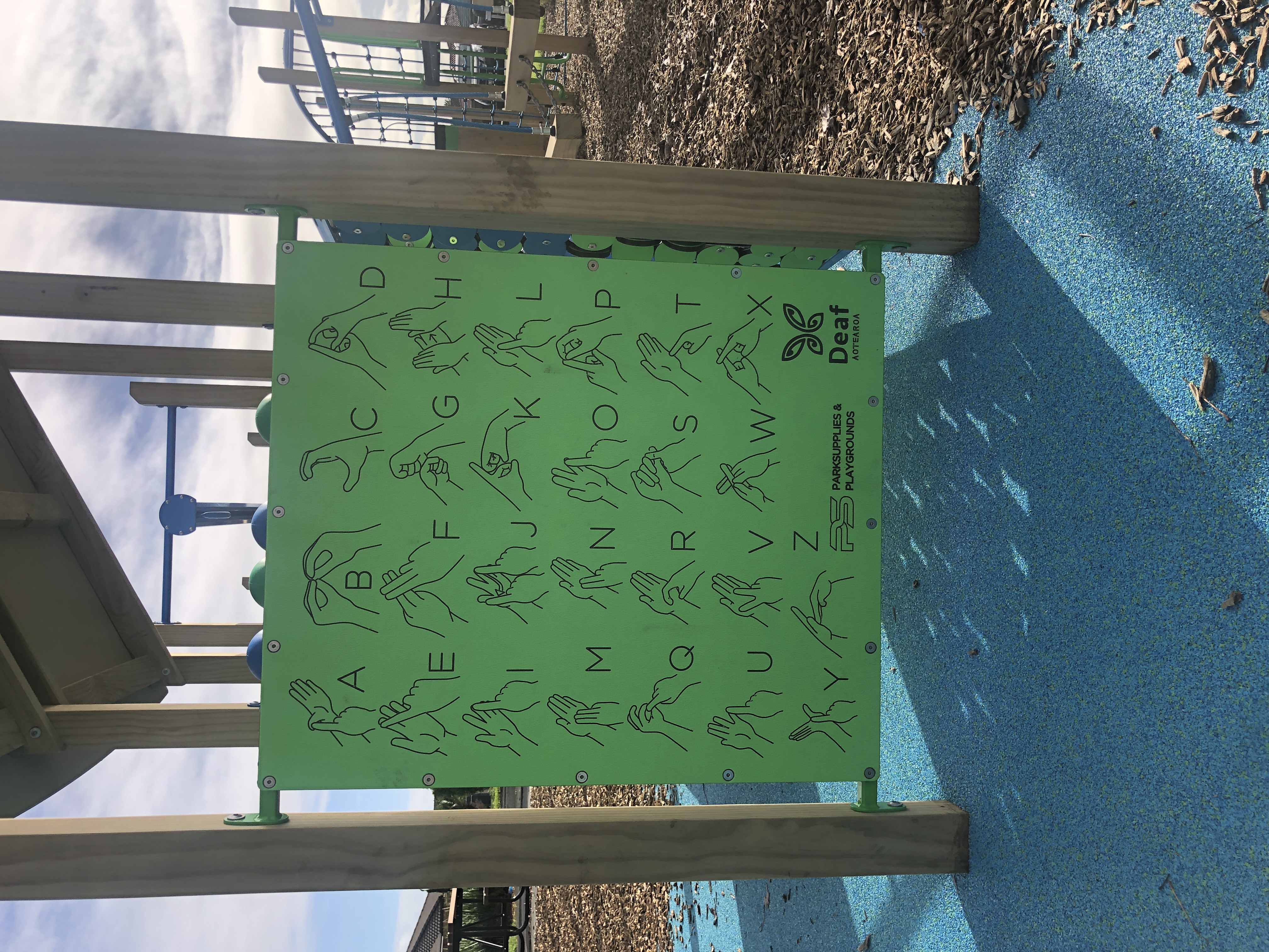 Sign language sign at playground.