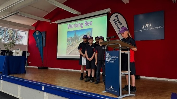 Kids presenting an award