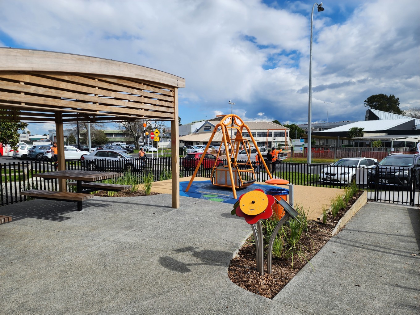A picnic area and a playground in a local neighbourhood. 