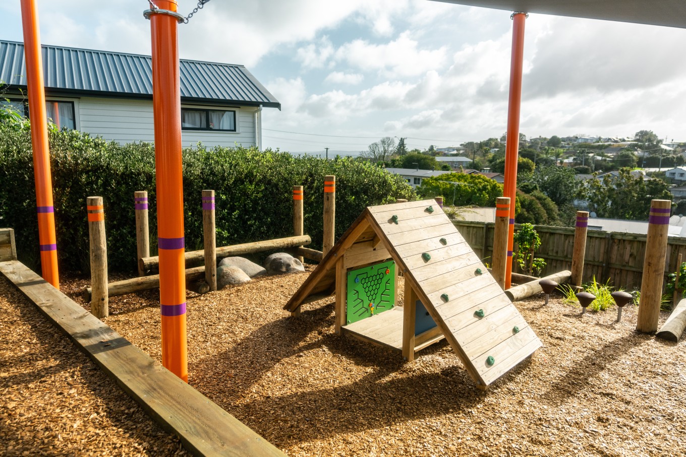The climbing wall, cubby house and playboards are a standout feature at Taurus Crescent Reserve.