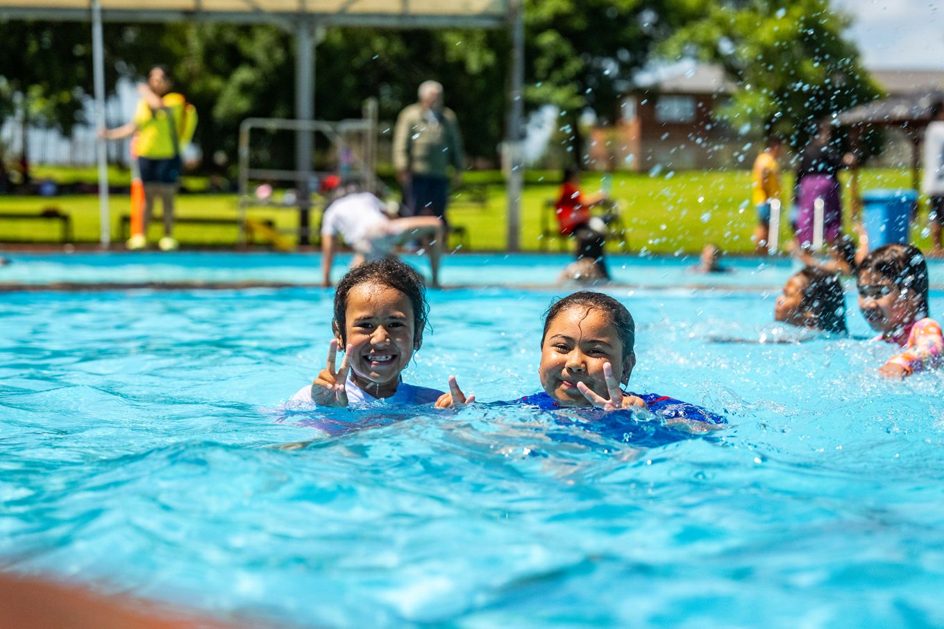 Kids in a pool.