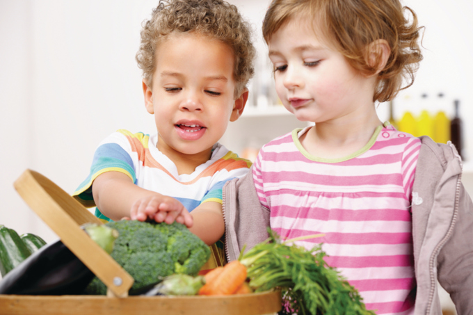 Tamariki connecting with nature through gardening on Waiheke