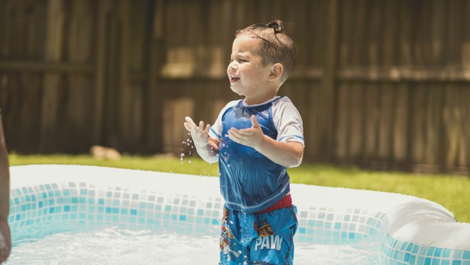 Child in a paddling pool