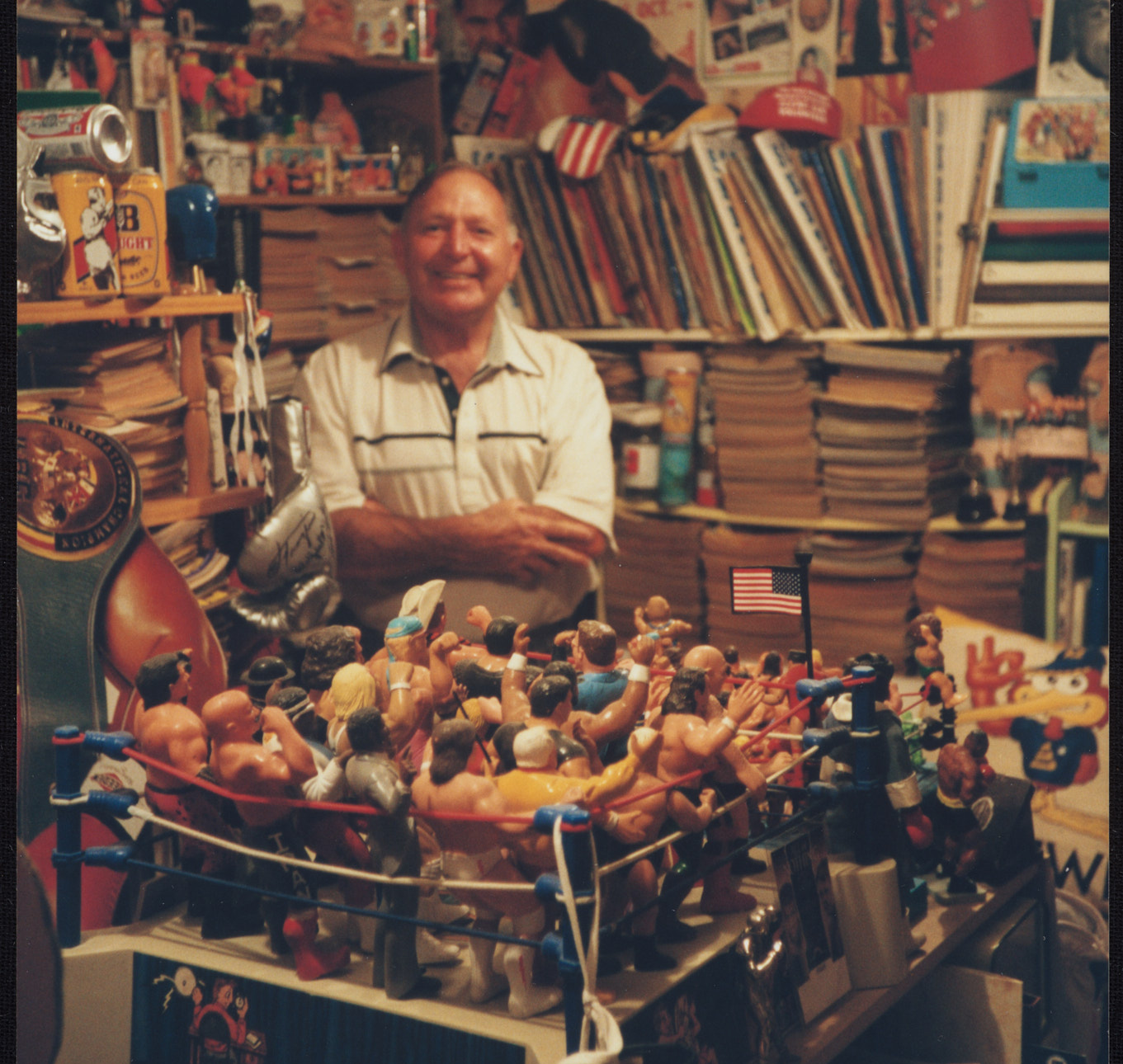 A man with wrestling merchandise.