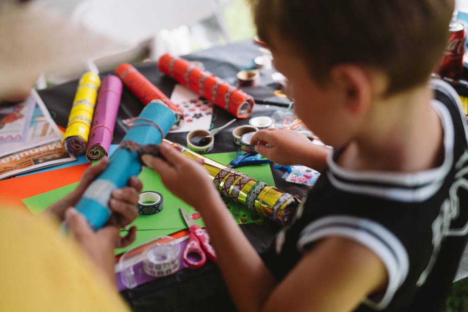 Child doing arts and crafts.