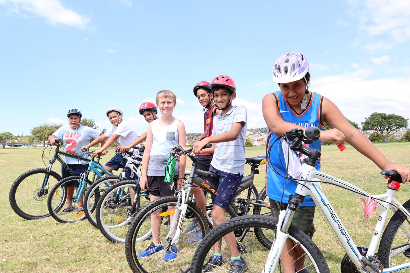 Kids playing on bikes.