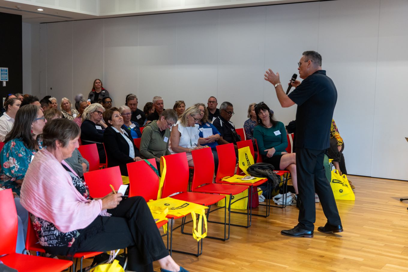 Greg Morgan speaking at AEM event. 