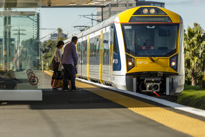 Family getting on train