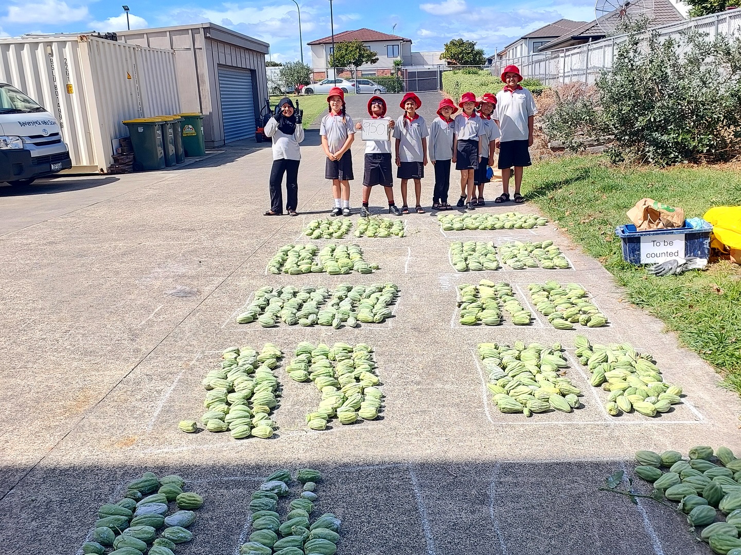 Kids doing community garden. 