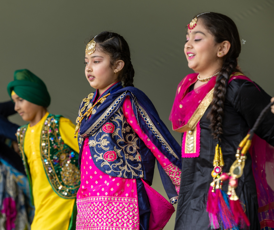 Indian children dancing.