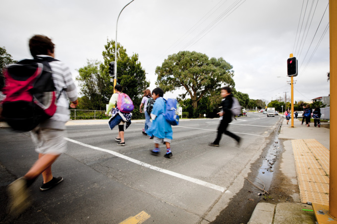 Blurred image of kids at crossing