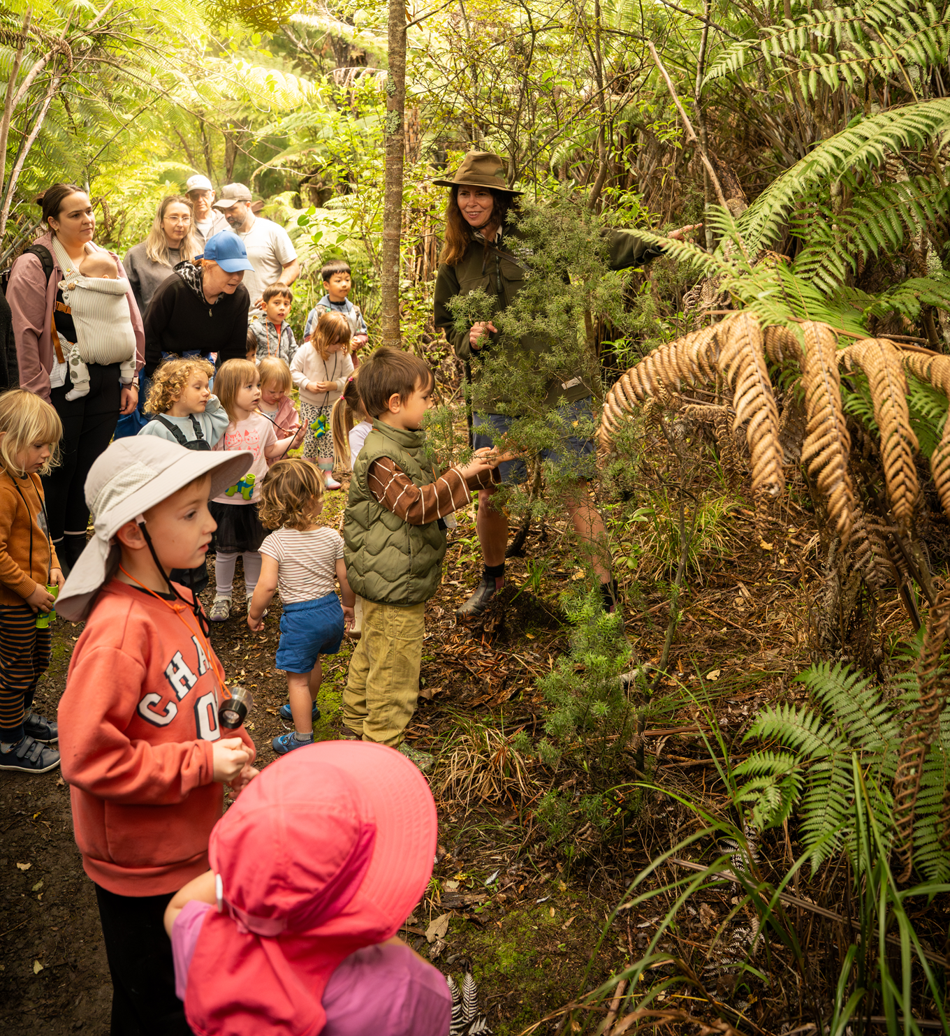 Children out in the bush with a ranger.
