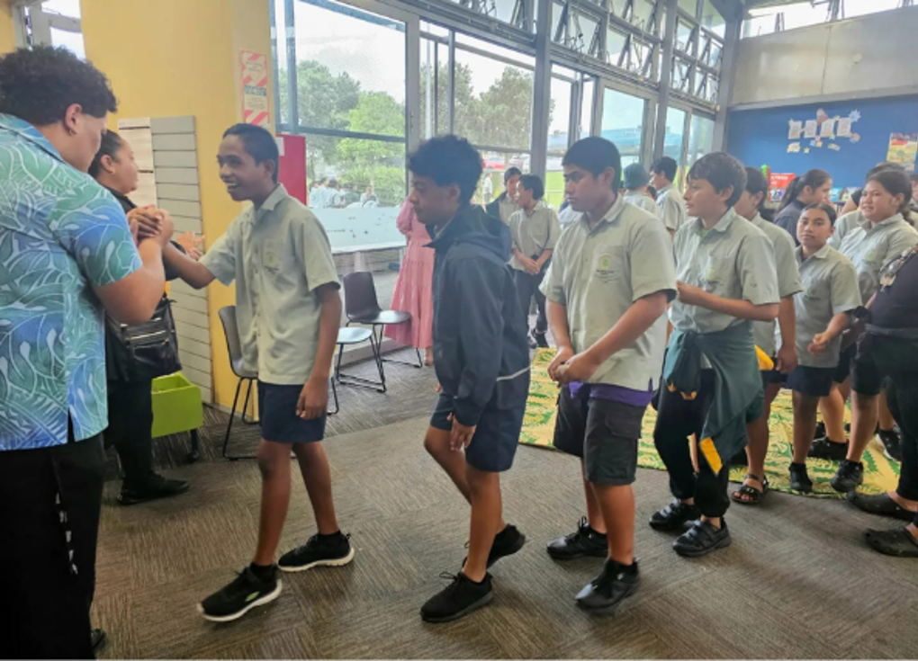 School kids in uniform attending a local community event