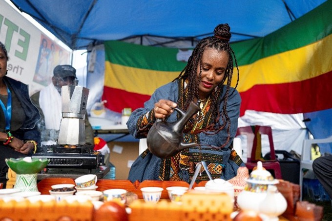 Local women with cups on display